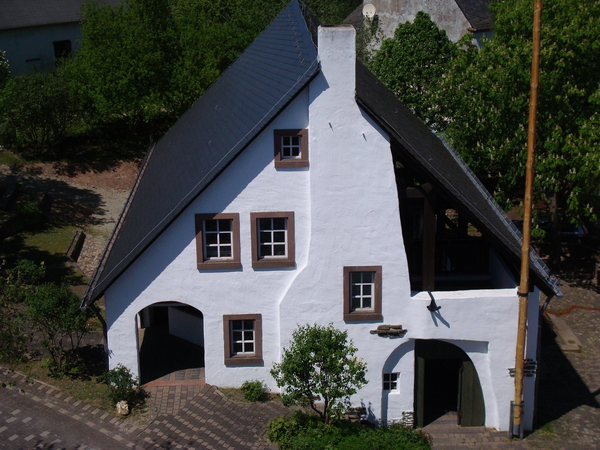 bescheid-dorfplatzhaus